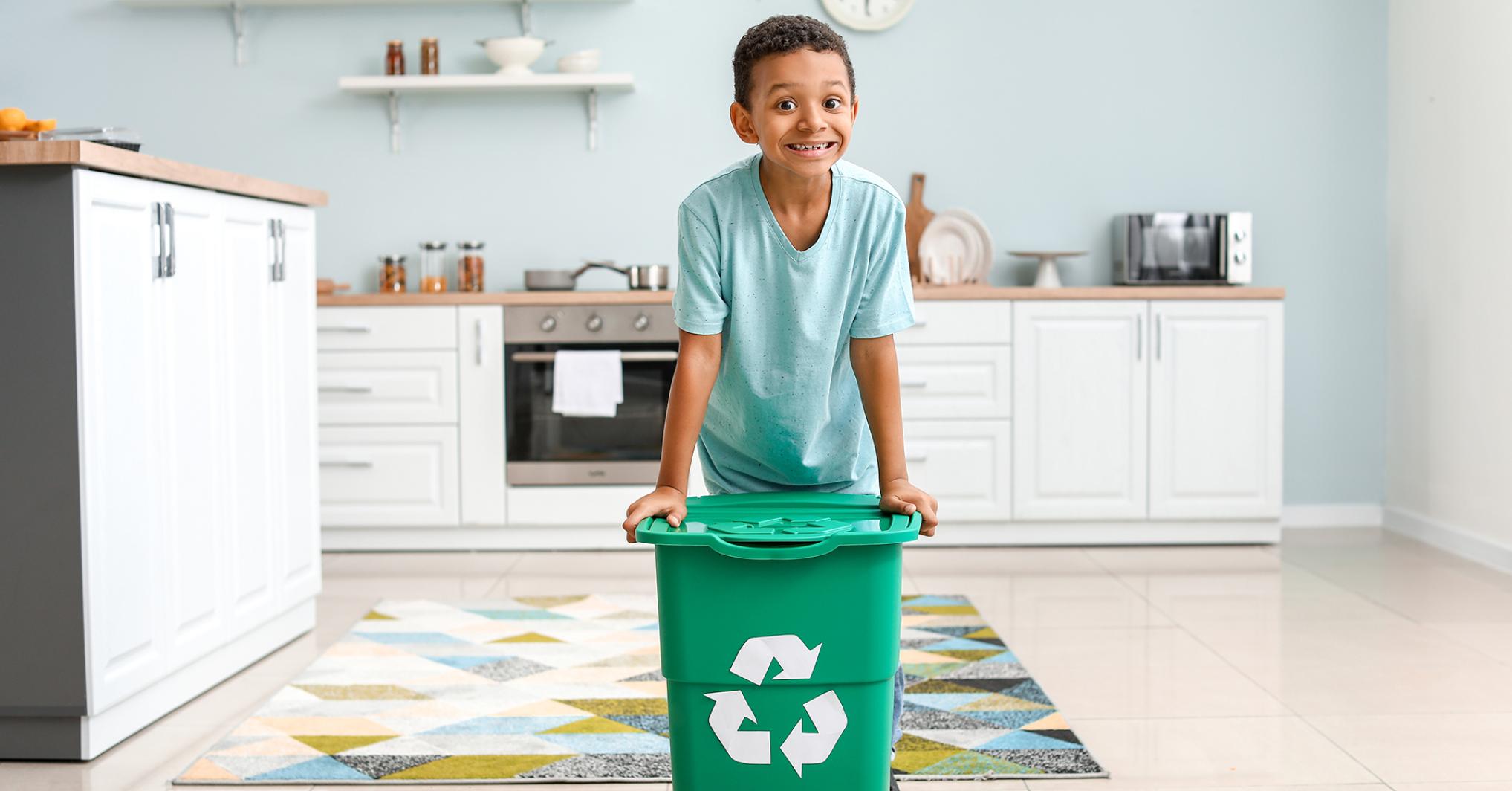 Kid with recycling bin