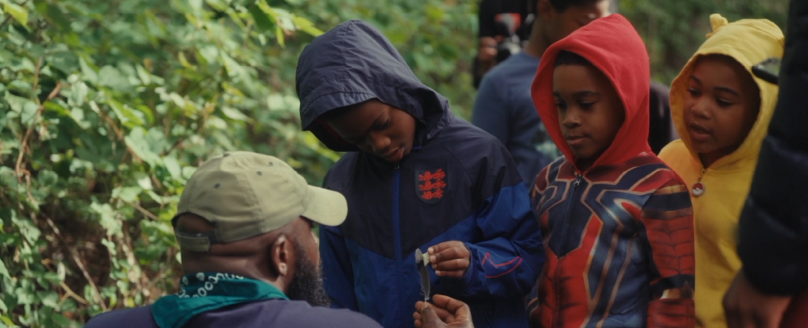 Kids learning forest science in the woods